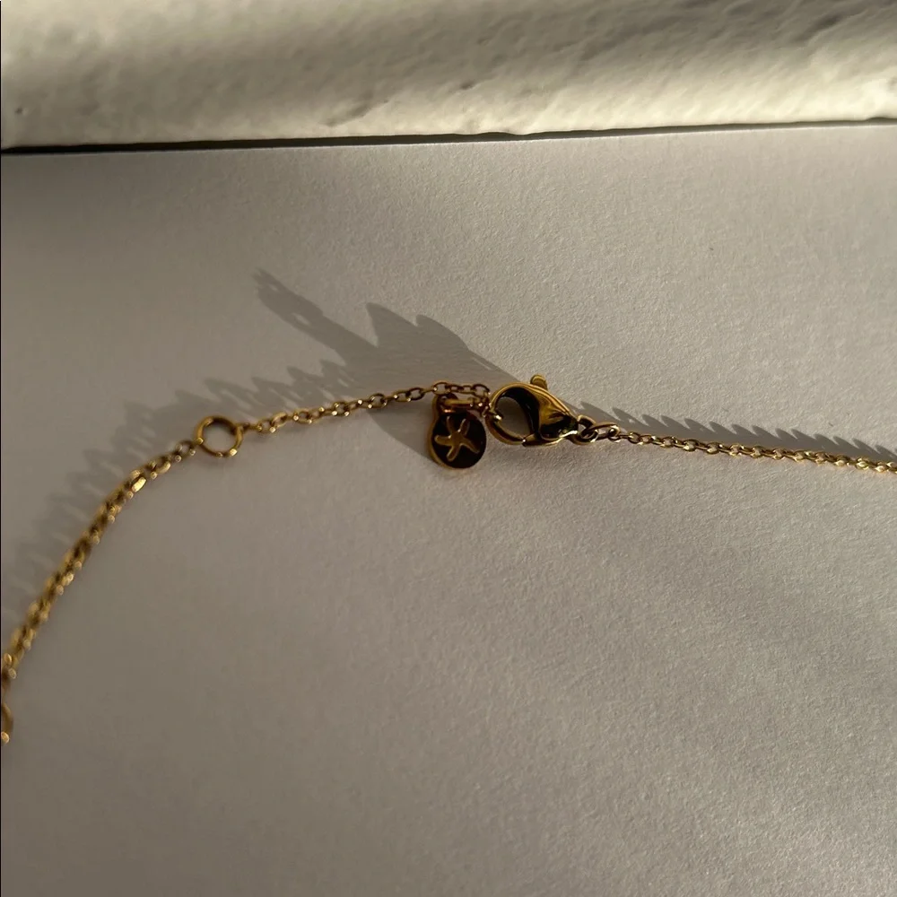 Gold and White Pendant Necklace